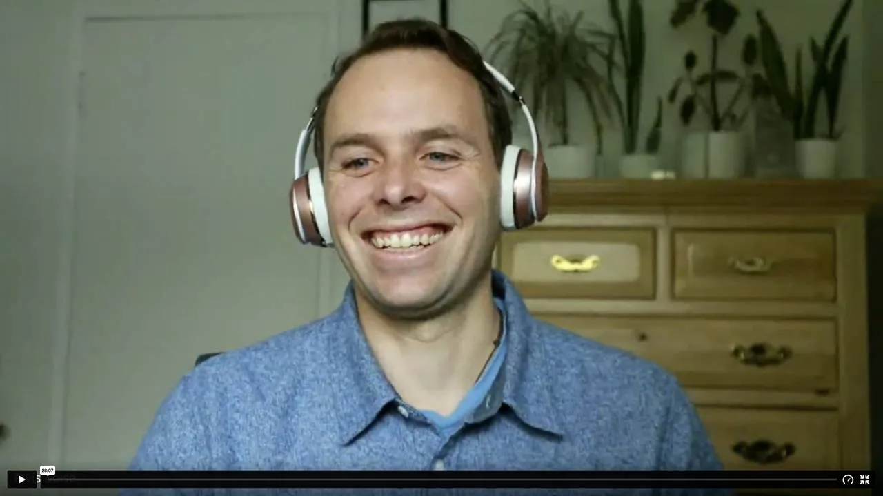 Tavis on a video call with a client